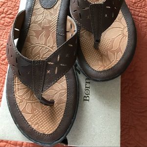 Brown born concept flip flops